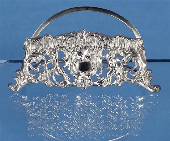 A pair of silver semi circular menu holders, by William Comyns, LENGTH; 3”/79mm Height; 1 ¾”/44mm